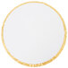 A white round cake drum with gold trim.