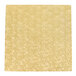 A white paper square with a gold floral pattern.