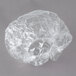 A clear plastic bag with a white background containing Noble Eco Novo Natura shower caps.