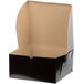 A black Enjay cake box with the lid open.