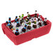 A Metro Mightylite BigBoy food pan carrier with a red lid filled with beer bottles on ice.