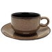A brown and white Oneida Rustic Chestnut coffee cup and saucer.