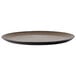 A brown porcelain Oneida Rustic pizza plate with a black rim.