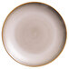 A close-up of a white Oneida Sama porcelain coupe plate with a brown rim.