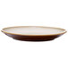 A brown and white Oneida Rustic Sama porcelain coupe plate with a rim.