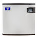 A white rectangular Manitowoc water cooled ice machine with a blue and black logo on a blue and white label.