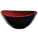 A close-up of a black and red Oneida Rustic Crimson porcelain soup bowl.