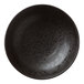 A black porcelain pedestal bowl with speckled surface.
