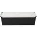A black rectangular container with a white label and a silver lid.