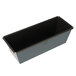 A black Matfer Bourgeat non-stick flared bread loaf pan with metal handles.