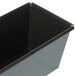 A black rectangular Matfer Bourgeat non-stick bread loaf pan with flared edges.