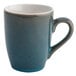 An 11 oz. blue and white porcelain coffee mug with a white background.