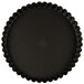 A black fluted tart pan with a removable bottom.