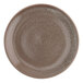 A brown Oneida Terra Verde Natural porcelain round plate with a speckled surface.