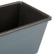 A Matfer Bourgeat steel bread loaf pan with black handles.