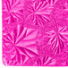 A pink Enjay 1/2 sheet cake board with an embossed floral design.