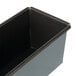 A black rectangular metal container with a brown edge.
