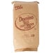 A brown bag of Domino light brown sugar with red text.