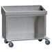 A stainless steel Steril-Sil silverware dispensing cart with wheels.