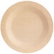 A close up of a Bamboo by EcoChoice round wooden plate.