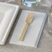 A Bamboo by EcoChoice compostable bamboo fork on a napkin.
