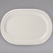 A Tuxton eggshell embossed rim china platter with a curved edge.