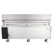A large stainless steel and black Cooking Performance Group gas countertop griddle with refrigerated drawers.