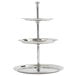 An American Metalcraft three tiered stainless steel display stand on a table in a catering setup.