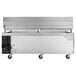 A stainless steel Cooking Performance Group chef base with wheels.