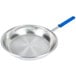 A silver Vollrath aluminum fry pan with a blue handle.