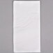 A Hoffmaster white 3-ply paper dinner napkin on a gray surface.