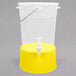 A translucent plastic beverage dispenser with a yellow base and lid.