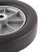 A black wheel with a grey rim and a metal center for a Continental tilt truck.