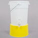 A white Choice beverage dispenser with a yellow base.