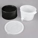 A white plastic container with a black base and spigot.