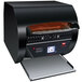 A black Hatco commercial conveyor toaster with digital controls.