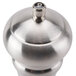 A close-up of the stainless steel knob on a Chef Specialties stainless steel pepper mill.