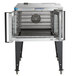 A Bakers Pride Cyclone Series electric convection oven with the door open.