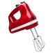 A red KitchenAid Ultra Power 5-speed hand mixer with stainless steel turbo beaters.