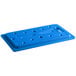 A blue plastic board with holes on a table.