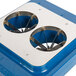 A blue and silver ventilator with two holes in a blue plastic box.