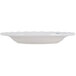 A white Thunder Group Blue Bamboo melamine plate with a scalloped edge.