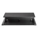 A black rectangular Luxor stand up desk top with a black shelf on top.
