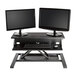A black Luxor two-tier stand up desk with two monitors.