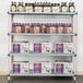 A MetroMax Q walk-in shelving unit with shelves of beer bottles and boxes.