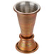An American Metalcraft Antique Copper Japanese Style Jigger with metal cups and round bases.