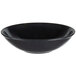 A black Vollrath melamine bowl.