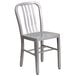 A Flash Furniture silver metal chair with a vertical slat back.