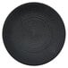 A black Oneida Urban porcelain coupe plate with a circular pattern.
