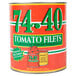 A Stanislaus #10 can of tomato filets on a counter.